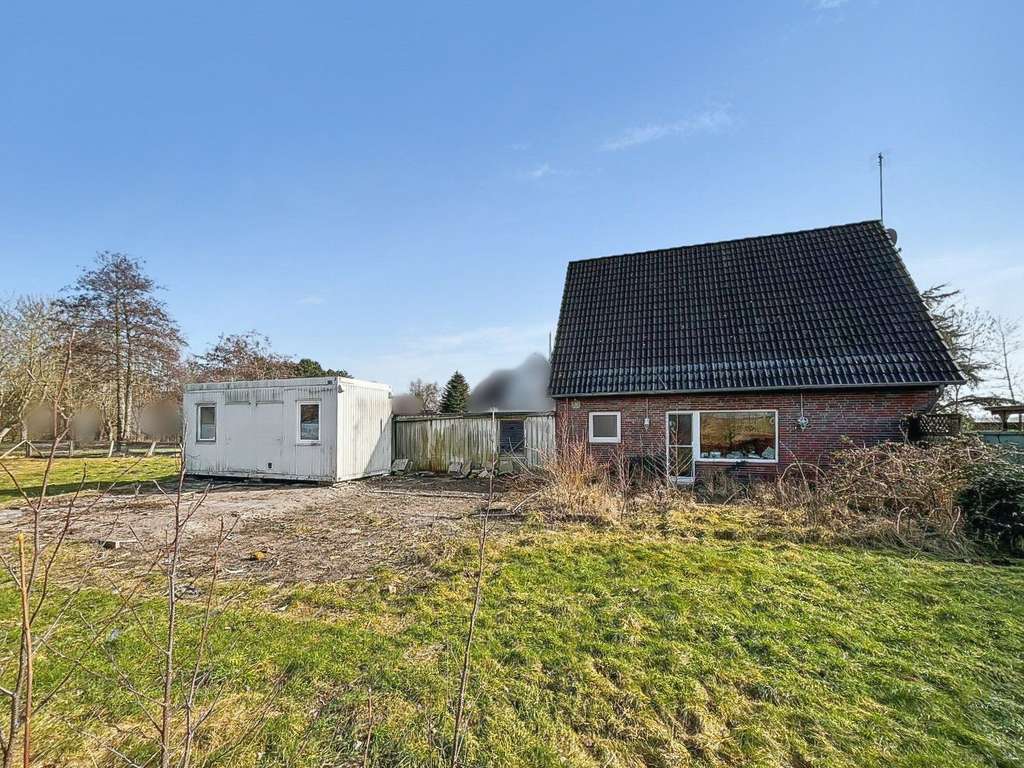 Immobilie in Butjadingen - Feines Wohnhaus auf ca. 1.527 m² Grund mit Sanierungsbedarf in Eckwarden nahe Nordseebad Tossens - Bild 2