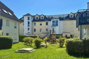 Freie Maisonettewohnung mit Balkon und Tiefgaragenstellplatz