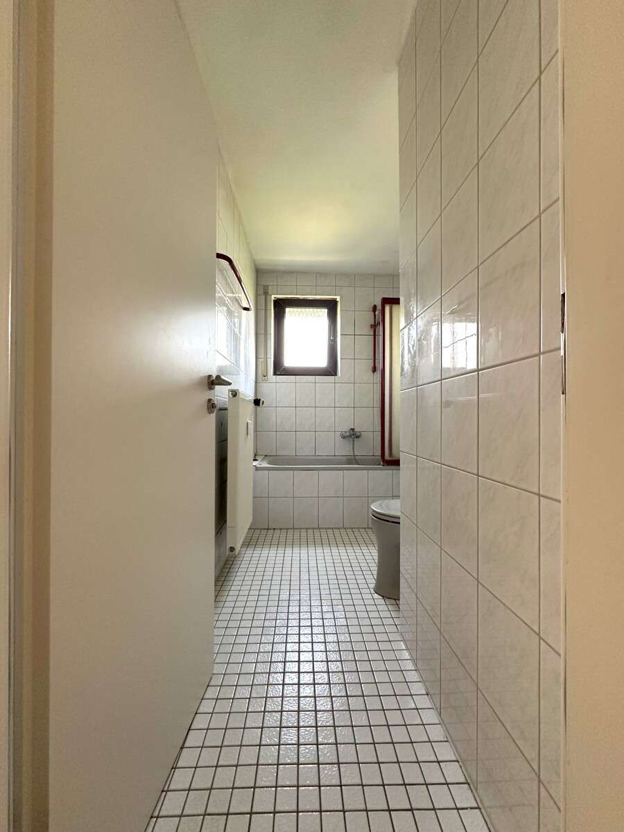 Immobilie in Wörth am Rhein - Helle 3-Zimmer Eigentumswohnung mit Balkon und Stellplatz in attraktiver Lage von Maximiliansau - Bild 11