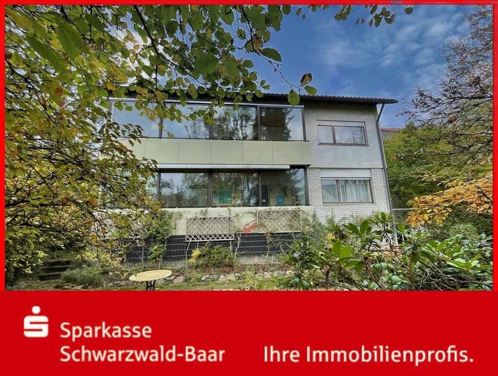 Zweifamilienhaus mit Ausbaupotenzial in attraktiver Wohnlage