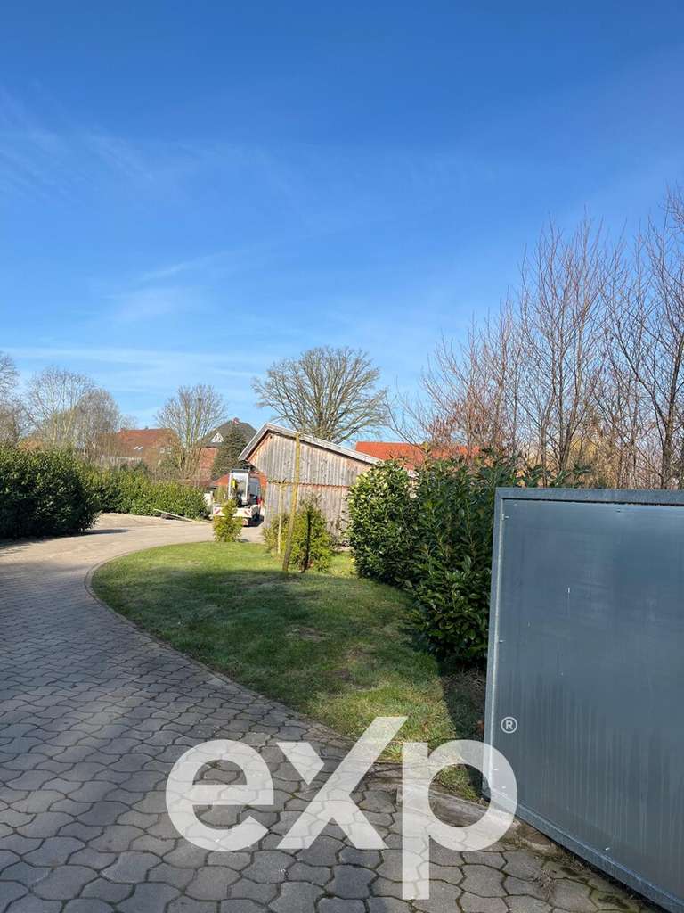 Immobilie in Badbergen - Exklusives Anwesen: 2 Wohnhäusern, großem Grundstück und vielfältigem Ausbaupotenzial in Badbergen - Bild 1