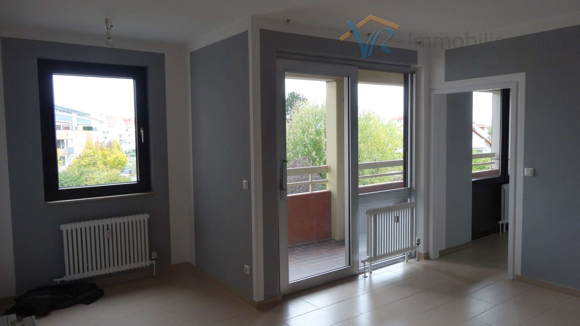 Immobilie in Ginsheim-Gustavsburg - Schicke vermietete 2 Zimmer-Wohnung in Ginsheim zum Verkauf - Bild 1