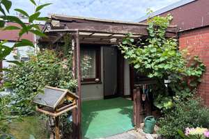Bremen-Kattenesch: Sanierungsbedürftiges Reihen-Bungalow mit Garage in ruhiger Wohnlage – Die vollständige Adresse der Immobilie erhältst du vom Anbieter., 28277 Kattenesch, Bremen – Vorschaubild 2