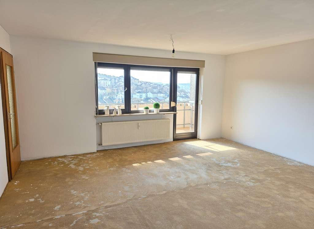 Immobilie in Veitshöchheim - Helle Eigentumswohnung mit Weitsicht, Süd-Balkon und Tiefgaragen-Stellplatz zu verkaufen - Bild 2