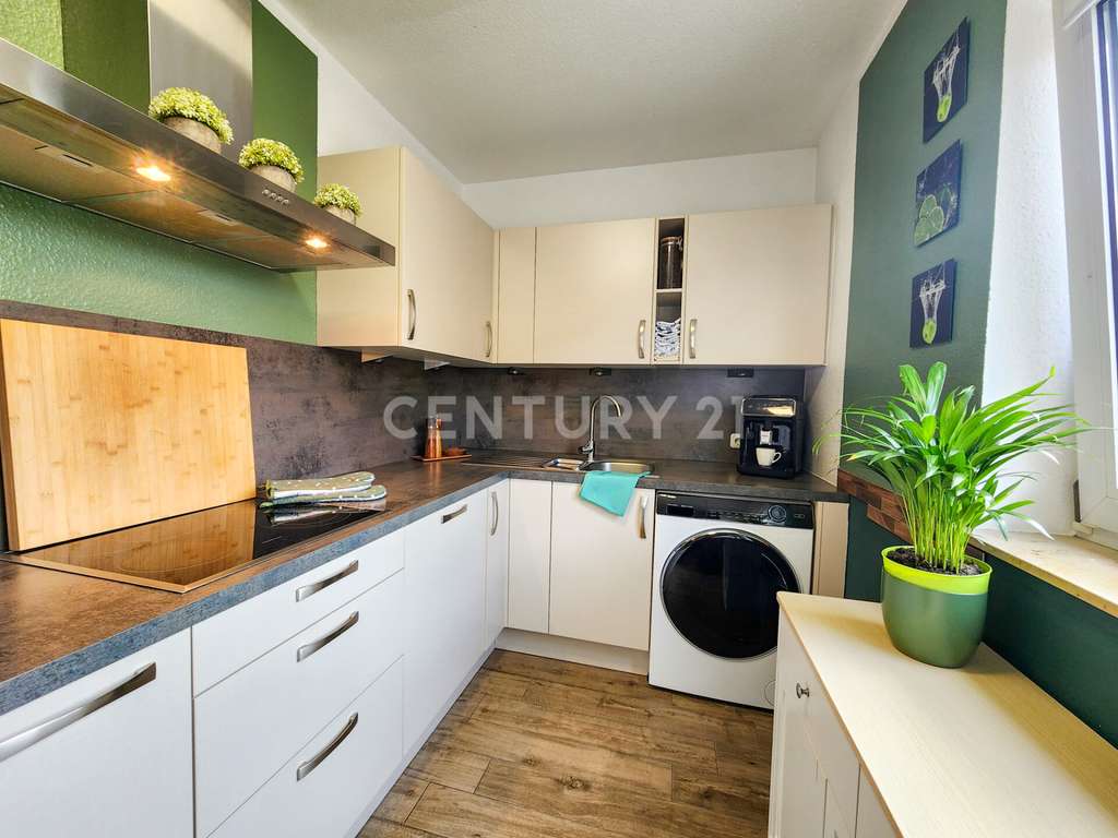 Immobilie in Birkenheide - Gepflegtes Wohnglück! 3 ZKB mit Balkon und Stellplatz - Bild 1