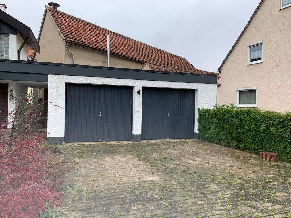 Immobilie in Neresheim - 4-Familienhaus mit zwei freien Wohnungen, 2 Garagen und Solar. - Bild 2