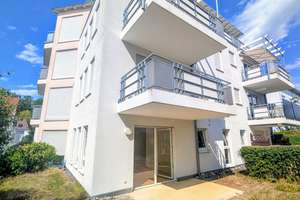 Barrierefreie 2,5 Zimmer-Wohnung mit 114 m² Privatgarten, Wallbox, Aufzug in bester Wohnlage