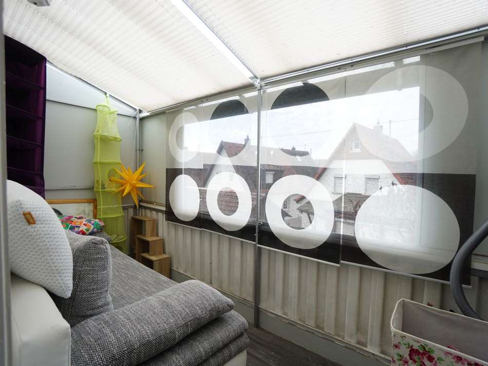Überdachter Balkon