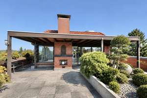 Beeindruckendes Penthouse mit 4 Zimmern, begrünter Dachterrasse und reizvollem Weitblick