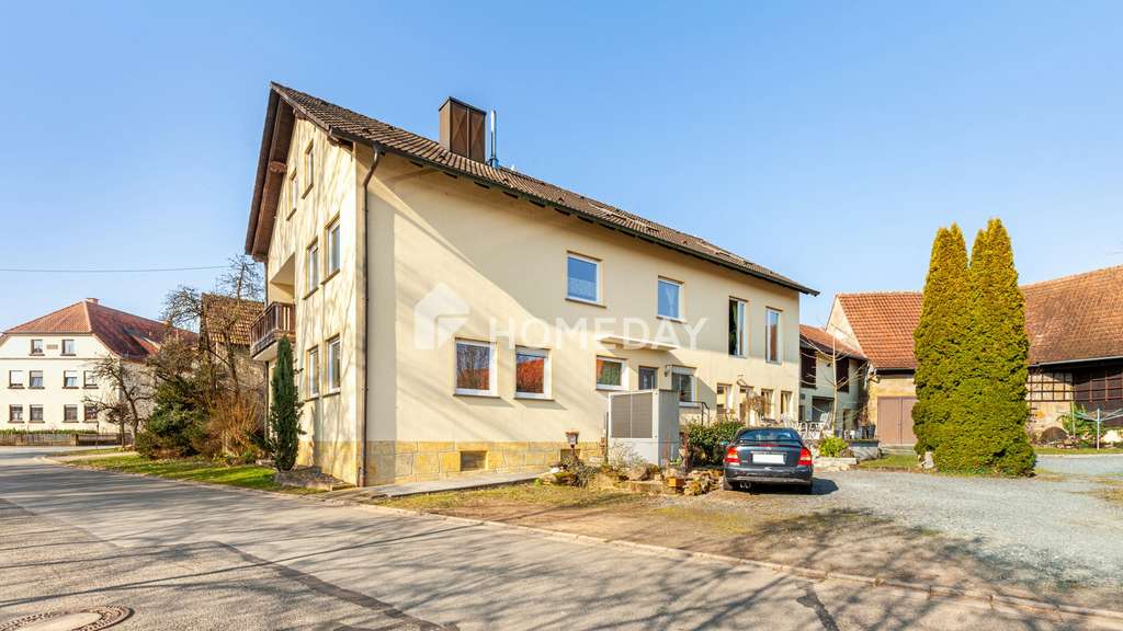 Immobilie in Rentweinsdorf - Ein Anwesen voller Möglichkeiten – Großzügiges Bauernhaus (4 WE) mit Hof & Scheunen
 - Bild 1