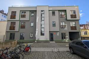 Moderne 3 Zi.-Wohnung im 2. OG mit offener Wohnküche (KfW-Effizienzhaus 40 Plus)