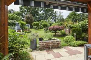 "Wohnen und Wohlfühlen" Im Reihenendhaus mit traumhaftem Garten