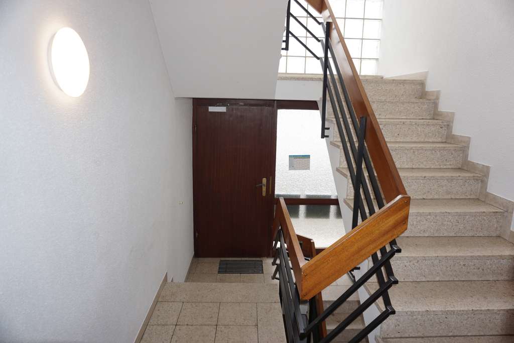 Immobilie in Bellheim - Drei-Familienhaus mit Doppelgarage, Carports und Garten - zur sofortigen Nutzung - Bild 1