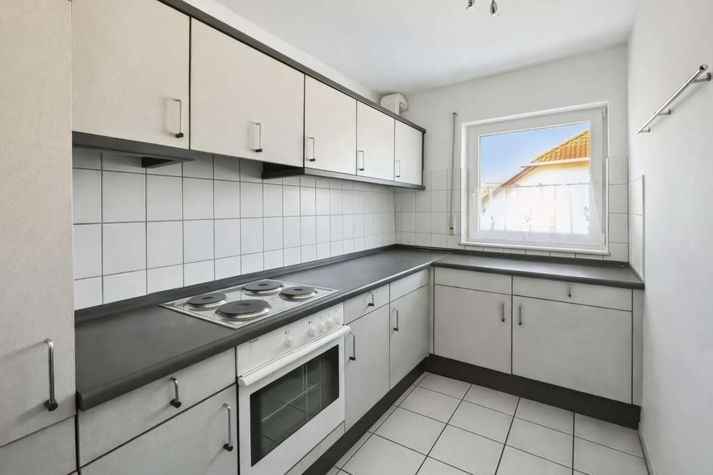 Immobilie in Veitshöchheim - Charmante Dachgeschosswohnung mit Balkon und zwei Stellplätzen - Bild 4