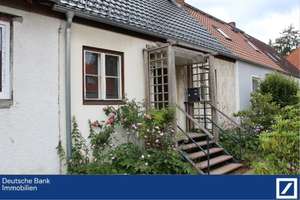 Reihenmittelhaus mit Investitionsstau in TOP-Lage