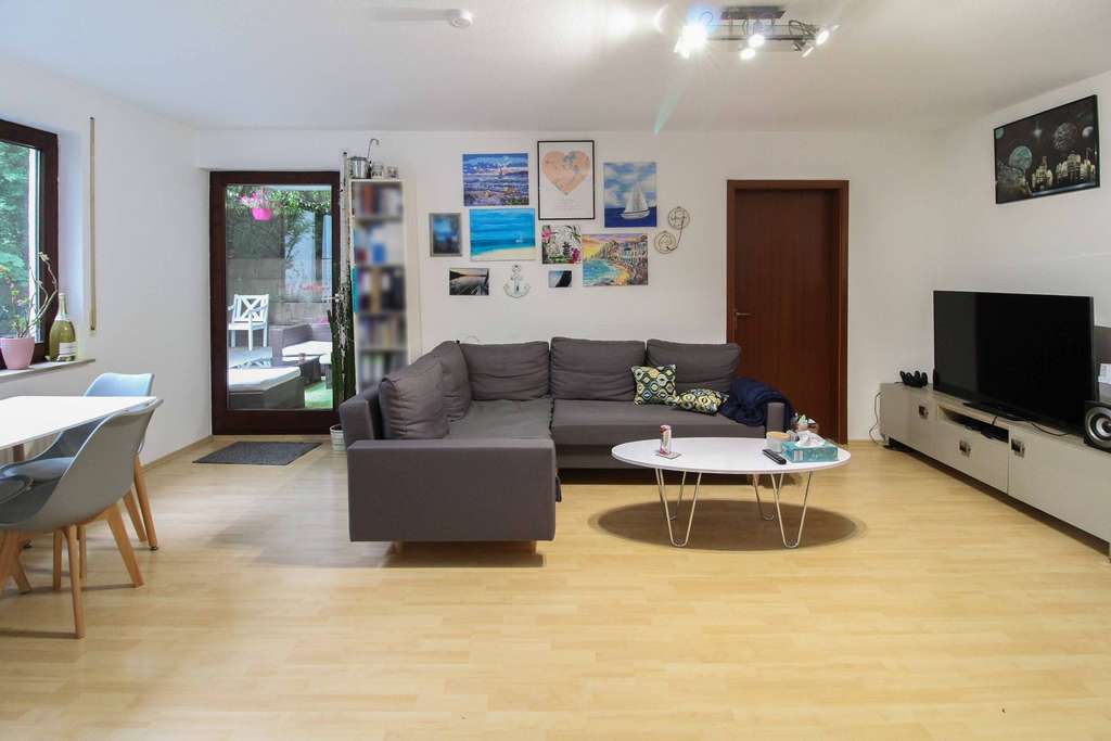 Die Sonne genießen: vermietete Souterrain-Wohnung mit eigener Terrasse und Freistellplatz