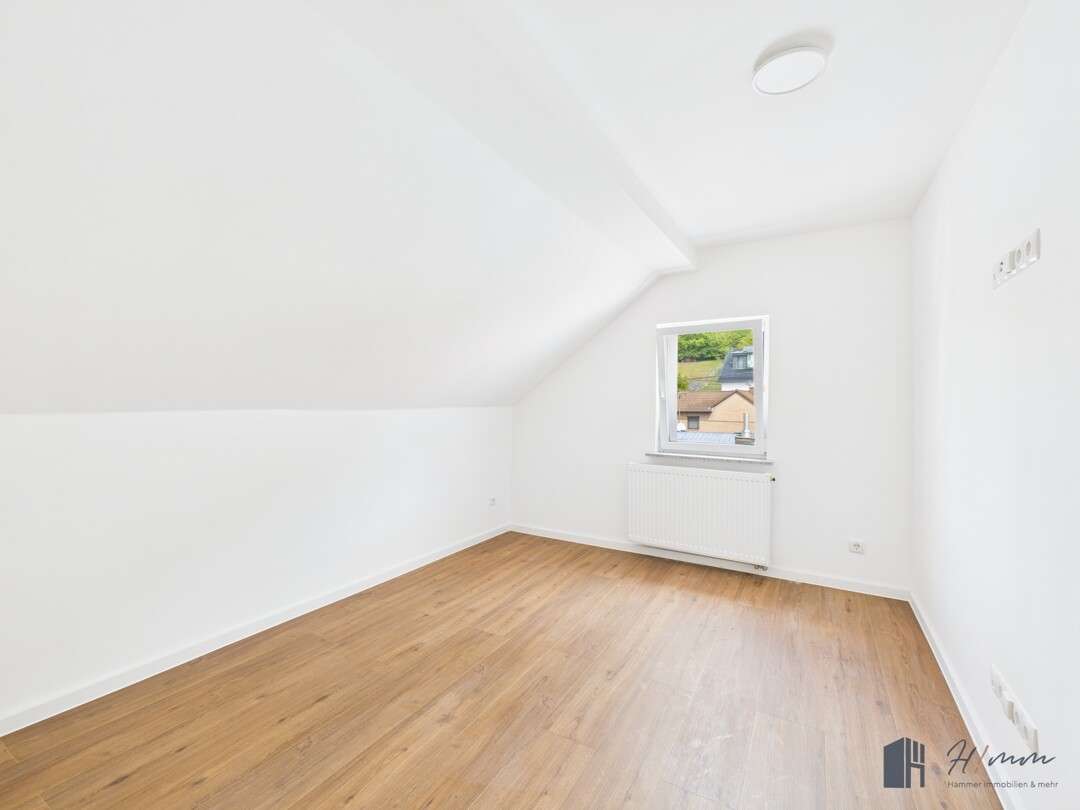 Immobilie in Rheinbrohl - Modernisiertes Reihenhaus in Rheinbrohl – Wohnen mit Rheinblick und Familienkomfort! - Bild 11