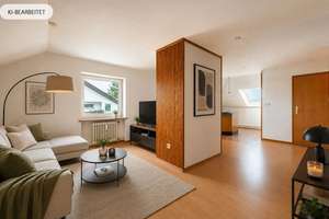 AIGNER - Mitten im Westend: Helle Dachgeschosswohnung mit offenem Wohnkonzept