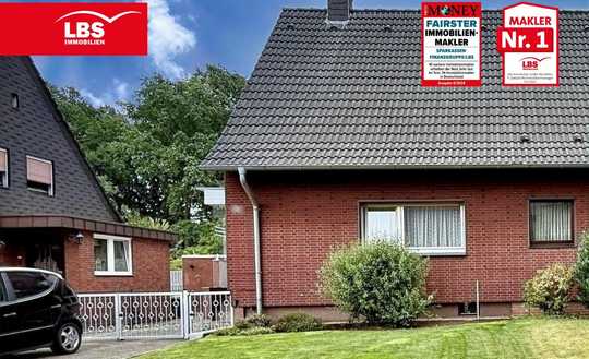 Doppelhaushälfte mit Gartenidylle und Potential!