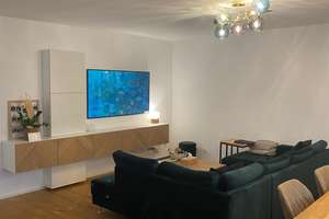 Stilvolle Luxuswohnung mit großer Terrasse, hochwertiger Einbauküche und Garage