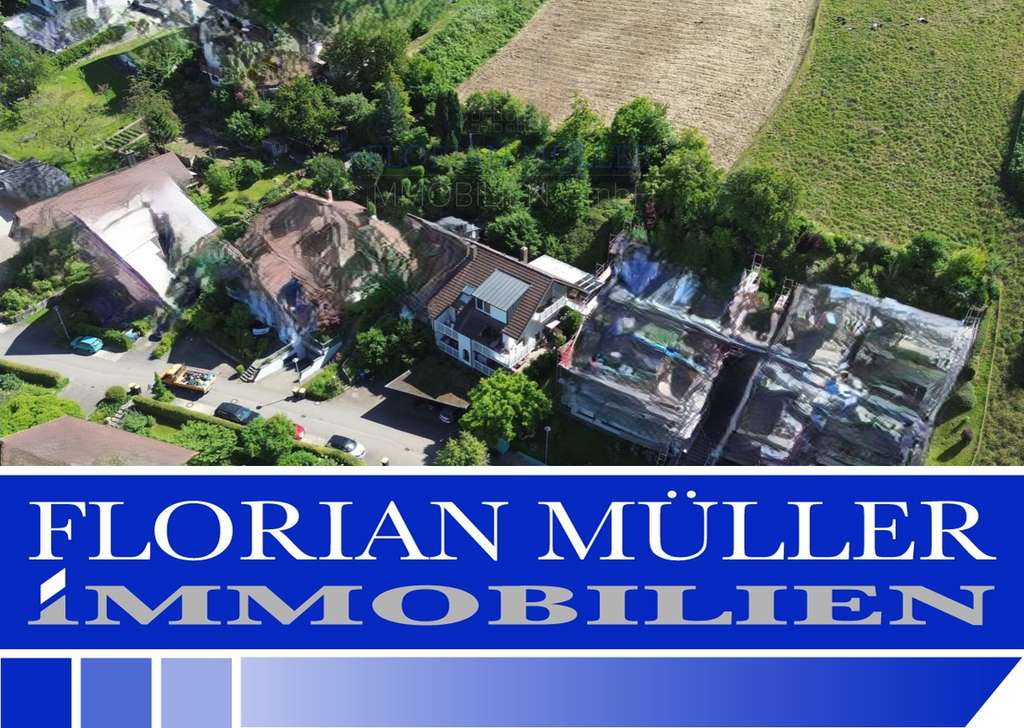Immobilie in Merzhausen - Top Aussicht über Merzhausen- DHH mit 2-Zimmer-ELW – Raum & Extra-Grundstück für die ganze Familie - Bild 0