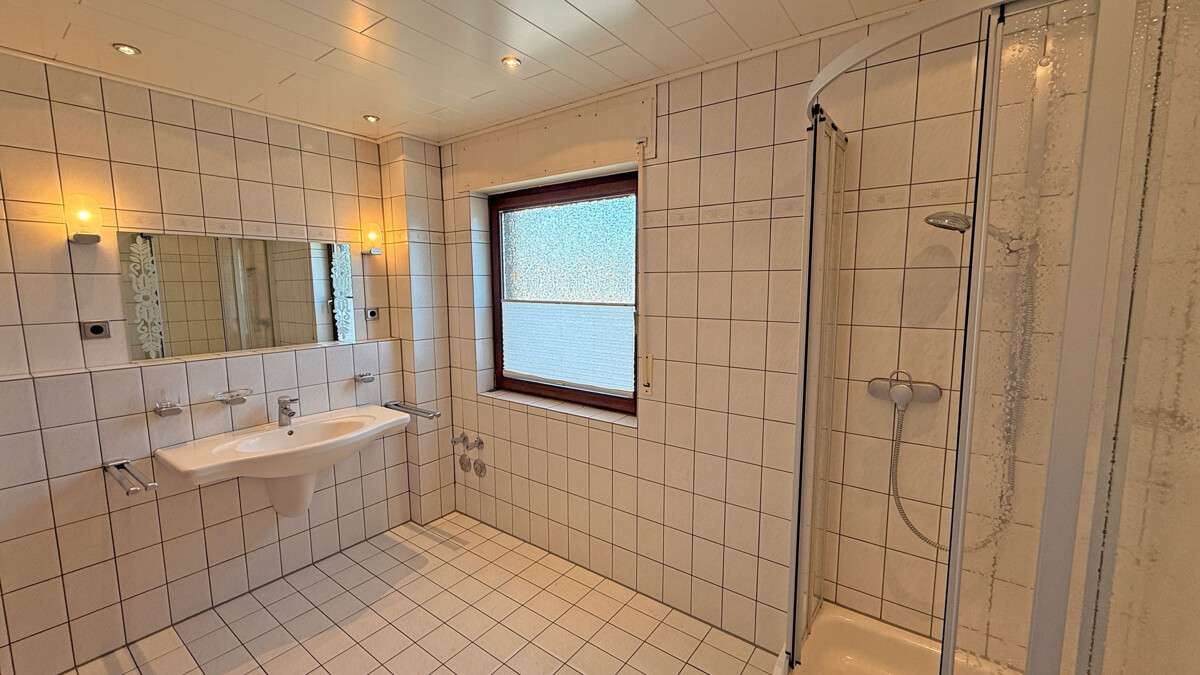 Immobilie in Dinslaken - Großzügige Maisonette-Eigentumswohnung mit Garage auf einem Erbpachtgrundstück in Dinslakener Bruch - Bild 8