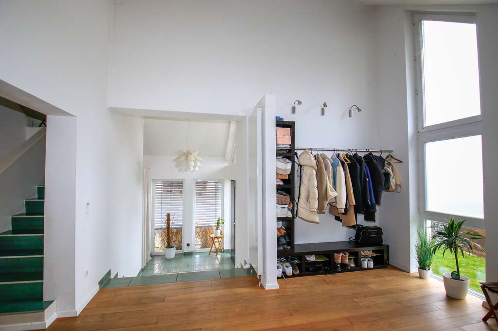 Immobilie in Bobenheim-Roxheim - Exklusives Einfamilienhaus auf drei Ebenen mit Garten und Entwicklungspotenzial - Bild 2