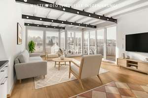 Lichtdurchflutete 3-Zimmer-Dachgeschosswohnung mit Dachterrasse und Blick in grüne Weite