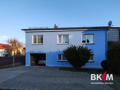 Klein, gemütlich, familienfreundlich – Haus mit Kamin und grüner Oase