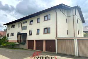 Gemütliche 2,5-Zimmer-Erdgeschosswohnung mit einer Terrasse und Einzelgarage!