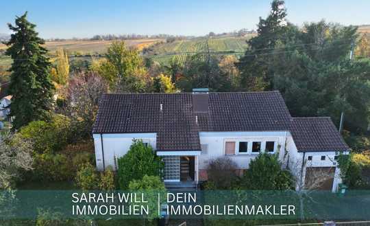 Wohnen in Traumlage – großes Grundstück inmitten der Weinberge mit Sanierungs & Aufstockpotenzial