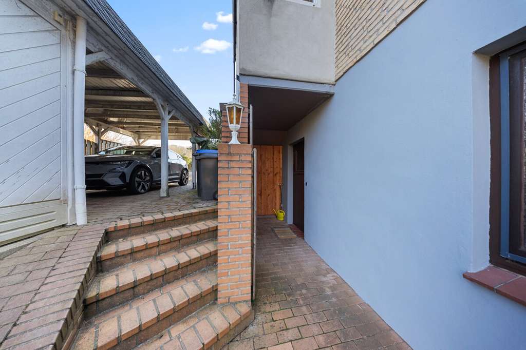 Immobilie in Eutin - Einfamilienhaus mit Einliegerwohnung, PV-Anlage und Süd-West-Garten - Bild 4