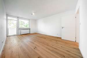 AIGNER - Hochwertig sanierte 3-Zimmer-Wohnung mit West-Loggia und modernem Wohnkomfort
