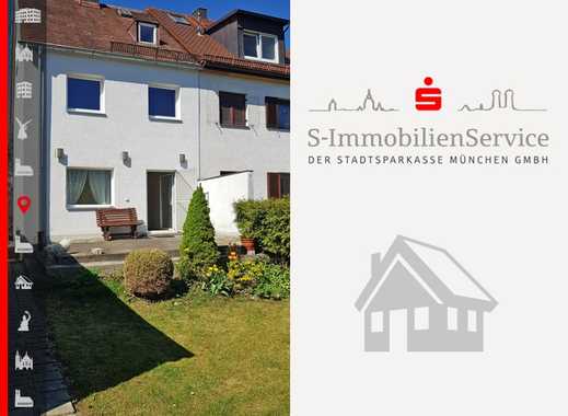 Charmante Doppelhaushälfte mit Garage und idyllischem, eingewachsenem Garten