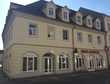1-Zimmer-Neubauwohnung im Dachgeschoss mit Balkon und Einbauküche