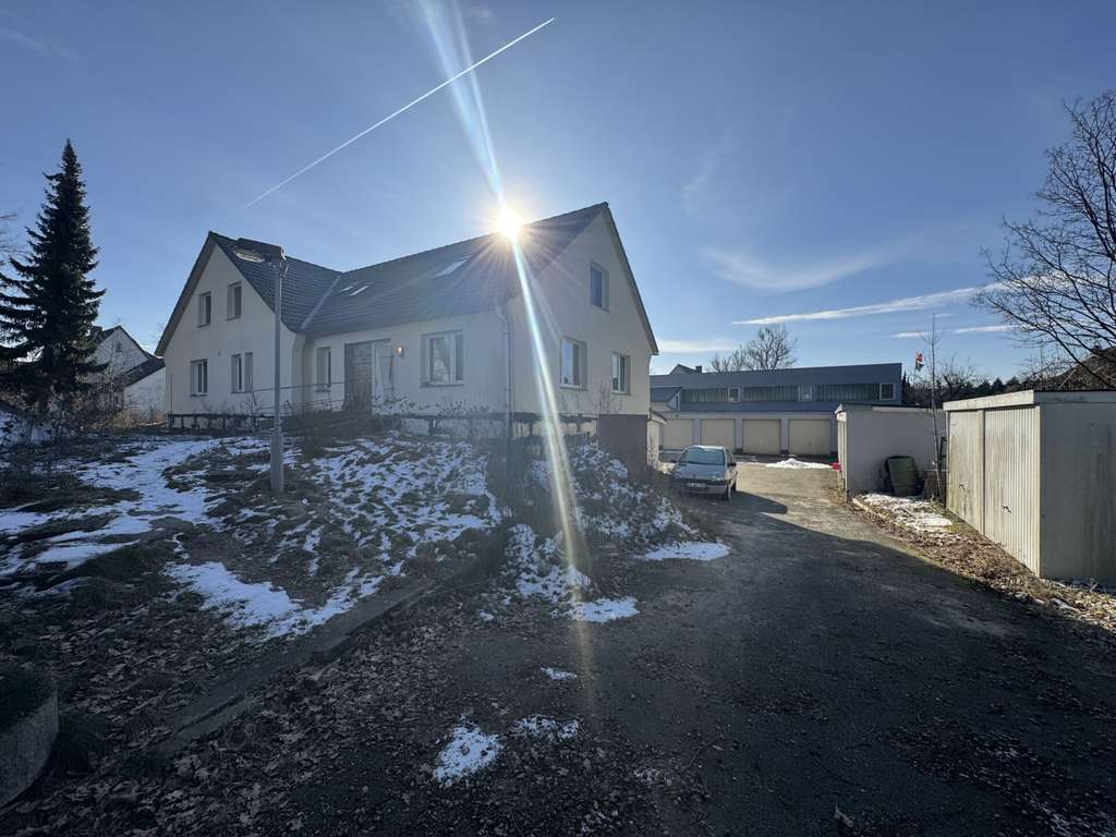 Immobilie in Adelheidsdorf - 7 Parteien Mehrfamilienhaus mit 11 Garagen in Adelheidsdorf - Bild 0