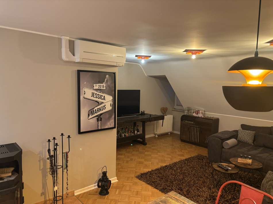 Wohnzimmer DG mit Kamin