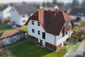 Großzügiges Einfamilienhaus mit Einliegerwohnung in Toplage von Ober-Mörlen – Die vollständige Adresse der Immobilie erhältst du vom Anbieter., 61239 Ober-Mörlen – Vorschaubild 1