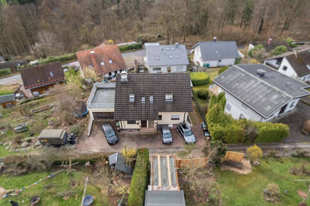 Immobilie in Heiligkreuzsteinach - Kernsanierte 4-Zimmer-Souterrain-Wohnung mit Südgarten, Terrasse und separatem Eingang - Bild 1