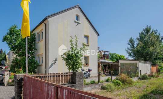 Familien(t)raum mit Garten & Wintergarten – Klassisches Haus in ruhiger Lage!