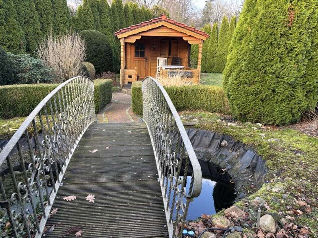 Immobilie in Dötlingen - Junger Bungalow mit Ausbaureserve in Nuttel - Bild 1