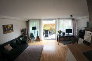 Gepflegte 2-Zimmer-Eigentumswohnung mit eigenem Garten, Terrasse & Einzel-Tiefgarage in München-Milb