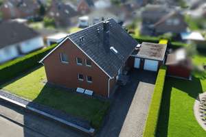 // Zuhause oder Vermietung? Warum nicht beides? Wohnhaus mit zwei WHG, Wintergarten, Loggia + Garage