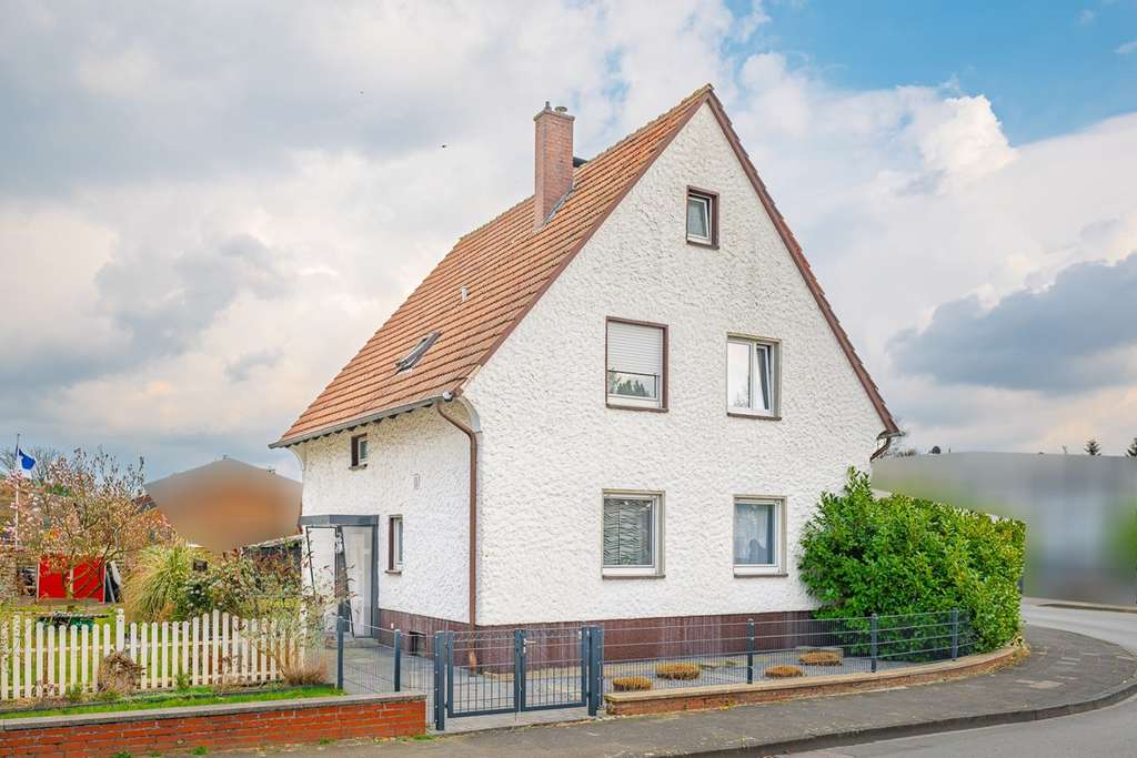 Familienfreundliches Einfamilienhaus auf großem Grundstück mit Garage und Carport in GT-Blankenhagen