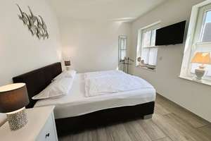 Exklusive und neuwertige EG-Wohnung mit Garten und PKW-Stellplatz in ruhiger Wohnlage – Die vollständige Adresse der Immobilie erhältst du vom Anbieter., 26736 Krummhörn – Vorschaubild 12