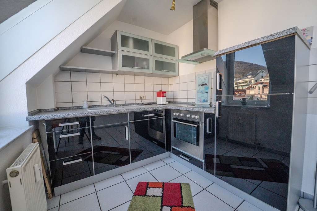 Immobilie in Dossenheim - Lichtdurchflutete 2-Zimmer-Wohnung mit Blick auf den Steinbruch - nur bei realunis - Bild 2