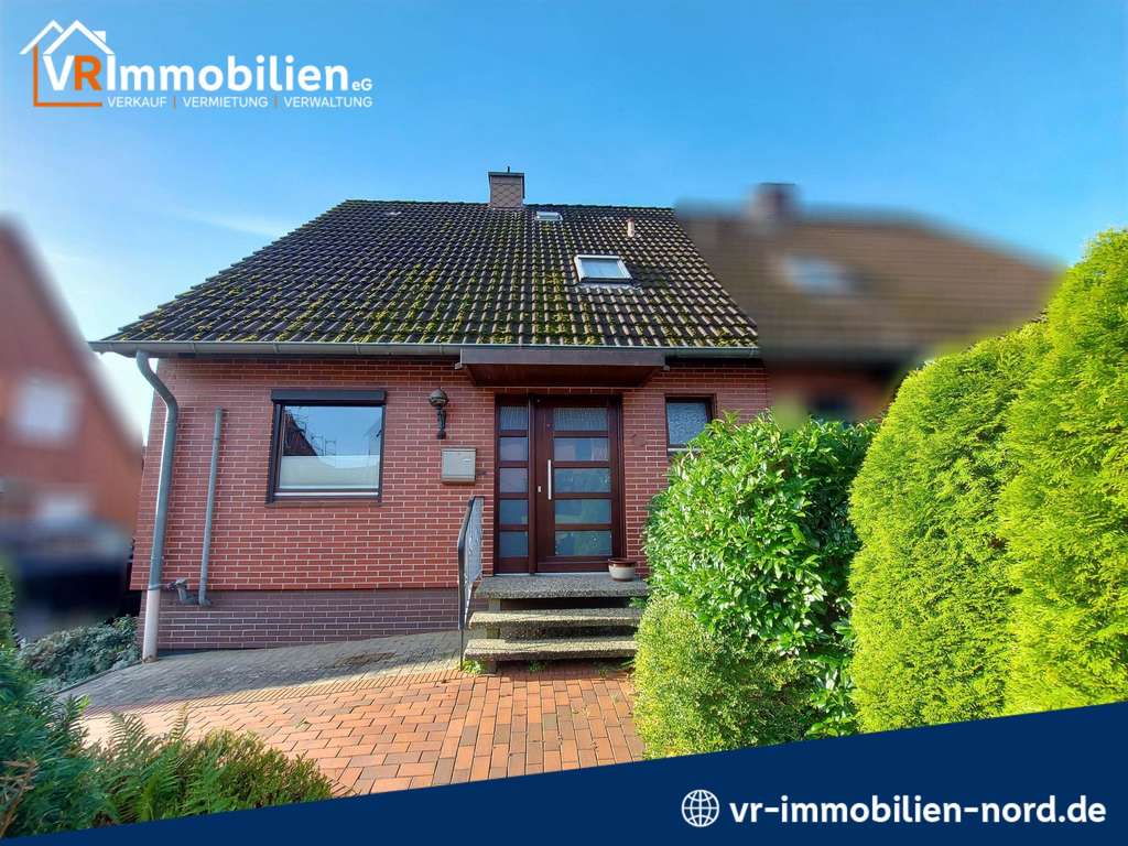 Immobilie in Hanerau-Hademarschen - Familienfreundliches Wohnen: Gepflegte Doppelhaushälfte mit Teilkeller, Garten und Garage - Bild 0