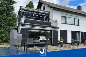 Bungalow mit schöner Einliegerwohnung und Wellnessbereich – Die vollständige Adresse der Immobilie erhältst du vom Anbieter., 34270 Schauenburg – Vorschaubild 1