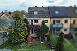 Familienfreundliches Reiheneckhaus mit großem Garten und viel Potenzial in ruhiger Lage