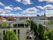 Au-2-Zimmer-Wohnung mit sonnigem Balkon und herrlichem Blick über die Dächer der Münchner Innenstadt